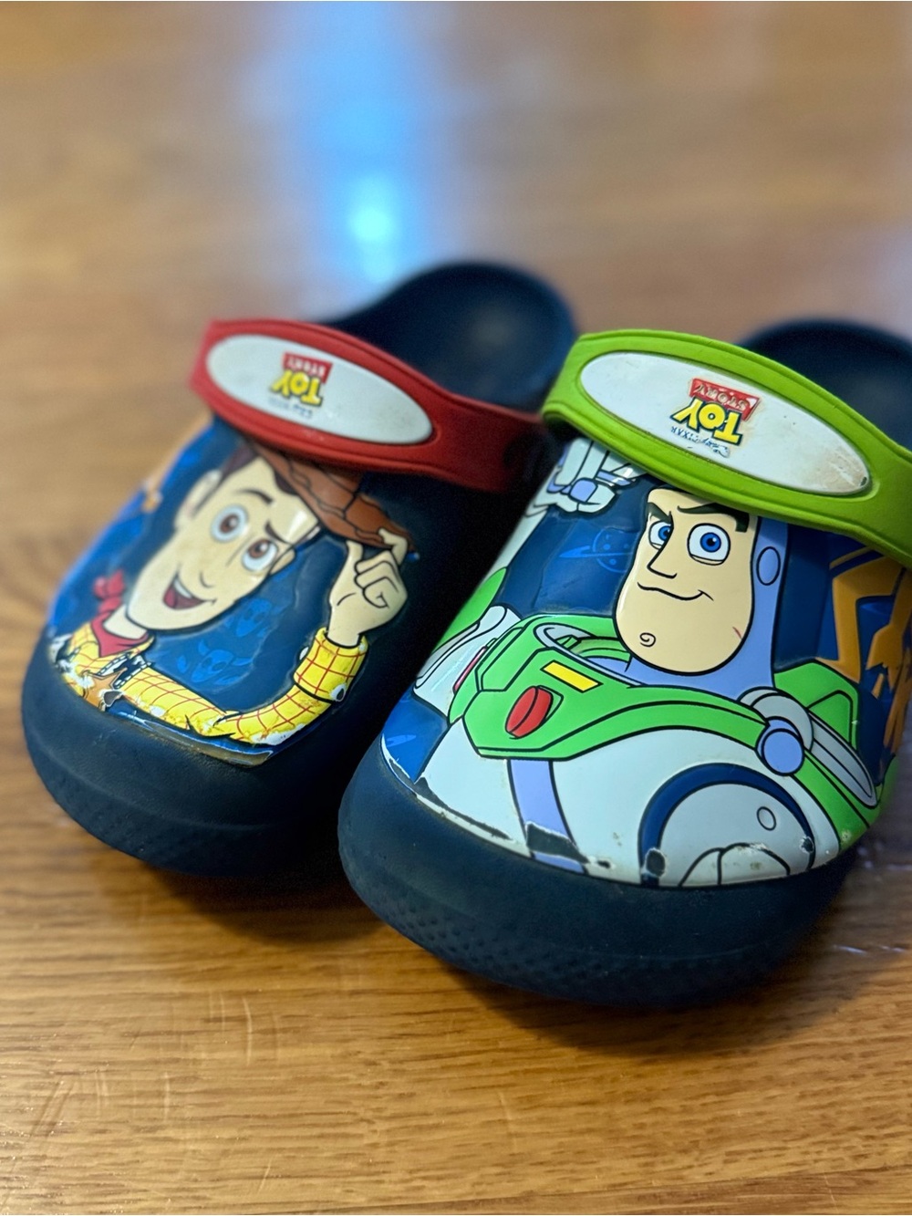 Adorable Disney Pixar Toy Story Crocs featuring Woody & Buzz Lightyear!